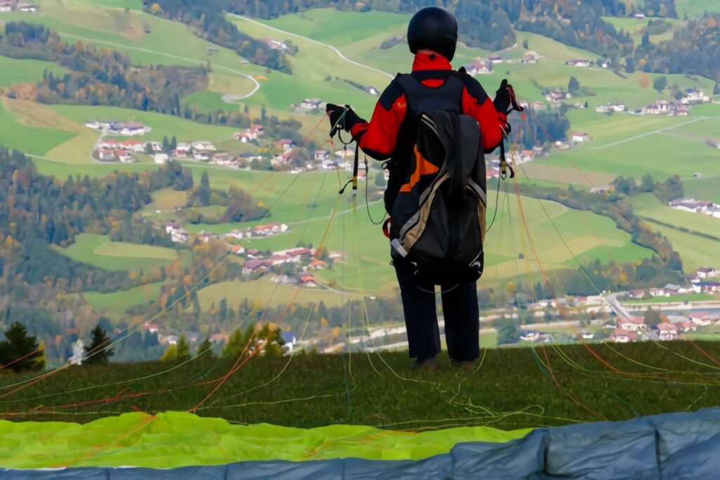 femme prête à s'envoler en parapente